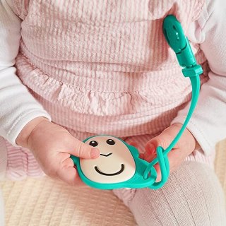 Matchstick Monkey gryzak silikonowy sensoryczny z zawieszką silikonową Green