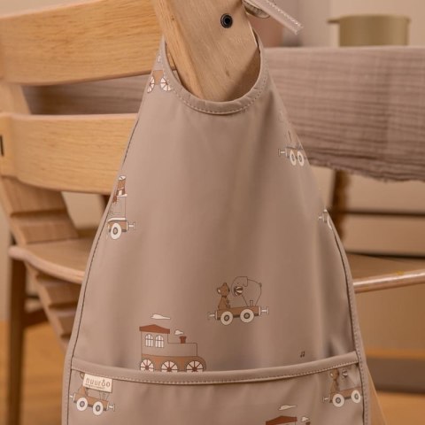 Nuuroo śliniak wodoodporny do pierwszych posiłków TRAIN Cream Carnival