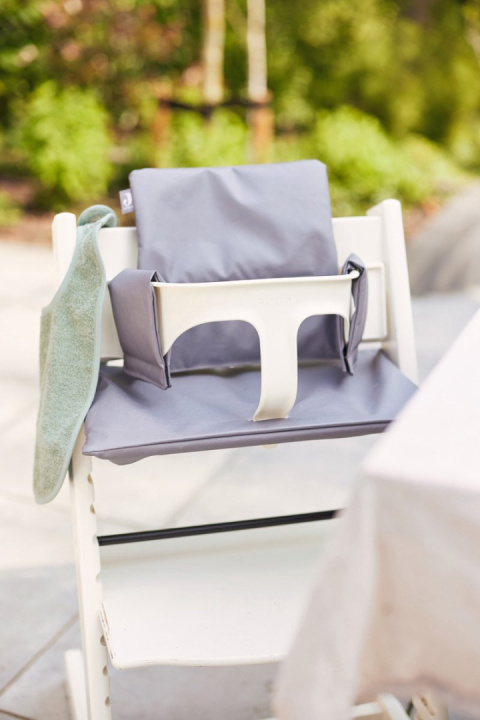 Poduszka stabilizująca dla niemowląt do krzesła Stokke Tripp Trapp szary Jollein